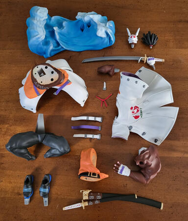 A real-life picture of a Nagoriyuki resin figure, processed, painted but disassembled.